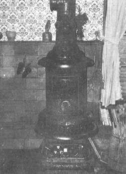 An inexpensive potbellied stove provides heat for sustainable living.